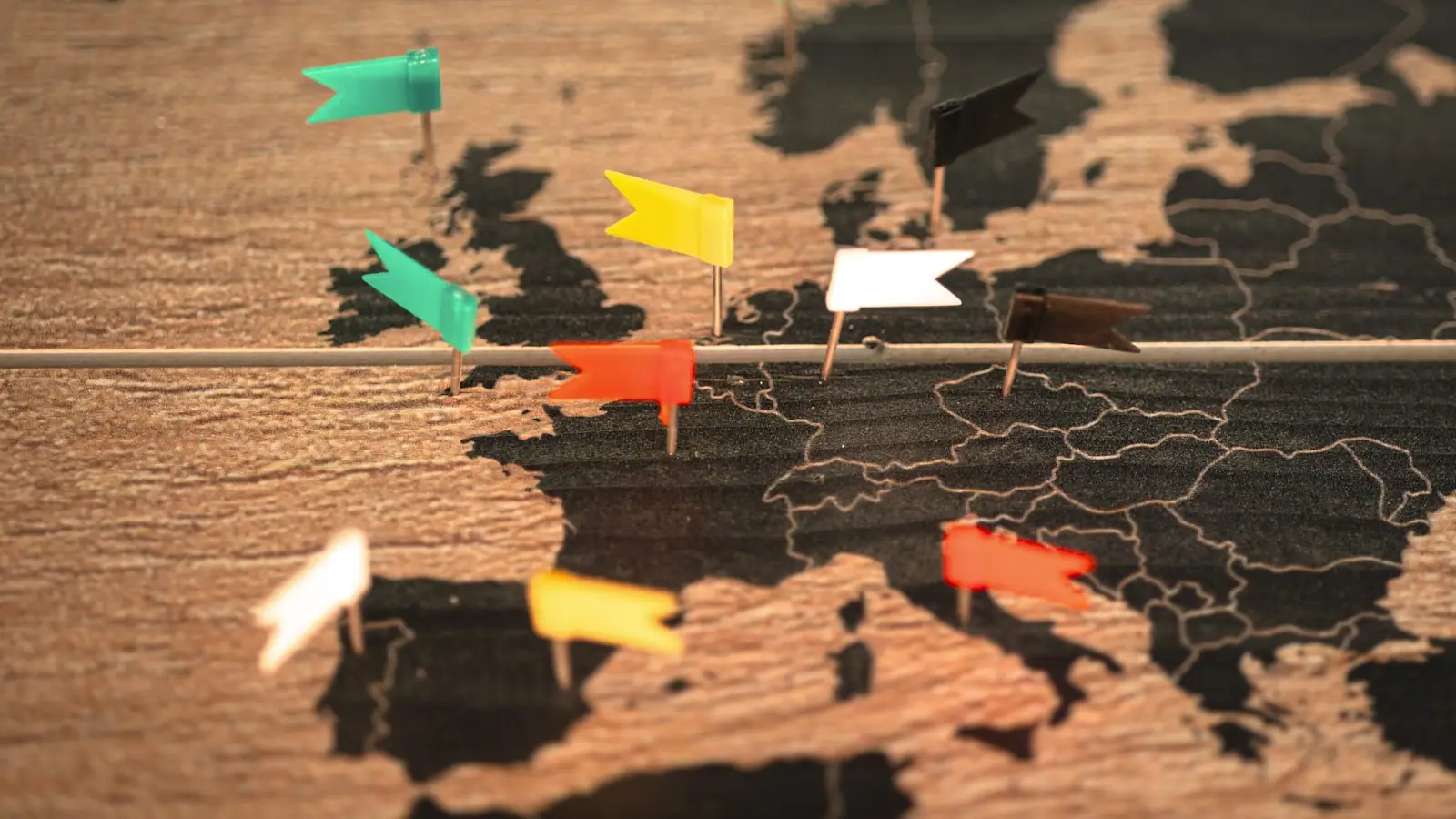 Marking a route on a map of Europe