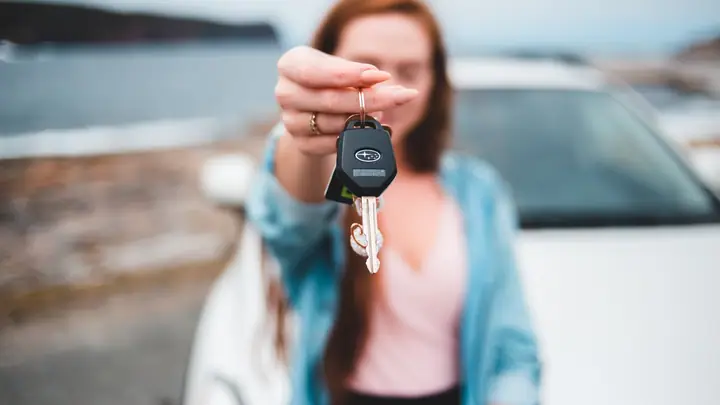 Rental car keys handed over with the paperwork