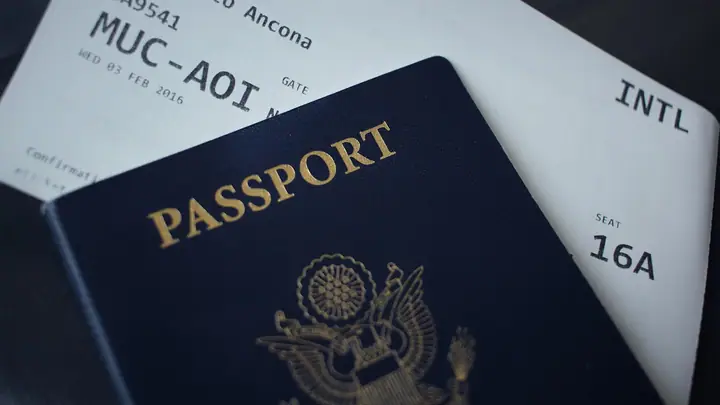 Indian passport with a boarding pass
