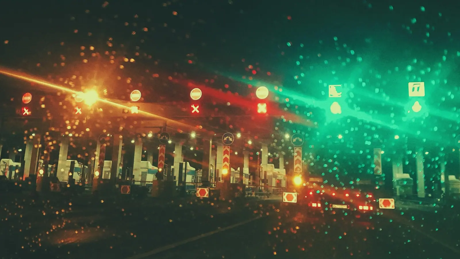 Cars passing through a European motorway toll station